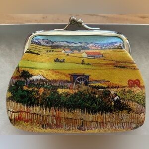 Coin purse that looks hand painted but I believe screened onto the fabric.